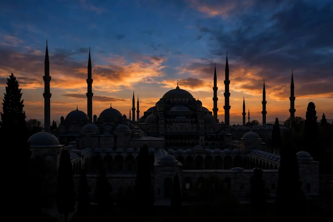 The silhouette of Ottoman palace courtyards at dusk, seat of the last caliphate