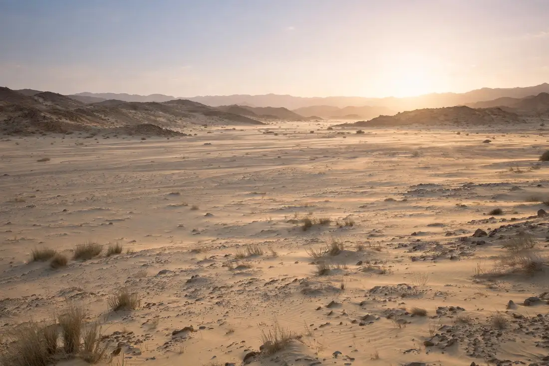 Barren desert wilderness between Medina and Mecca at sunrise